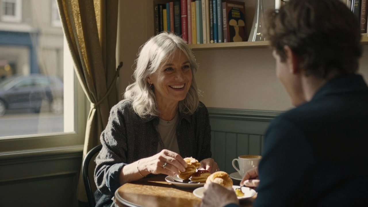 A woman in her 50s shares a thoughtful moment over coffee in a cozy Notting Hill café.