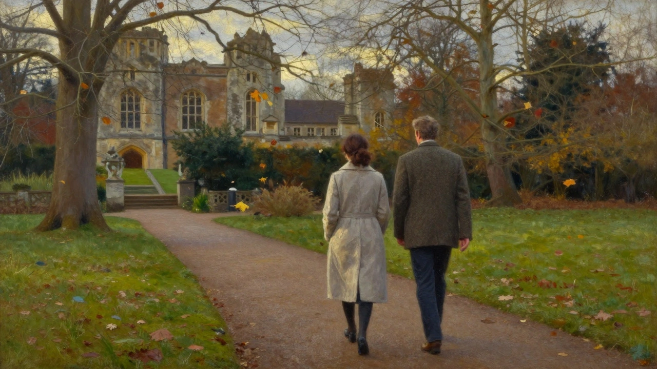 Two people walk slowly through Eltham Palace gardens in autumn, surrounded by falling leaves and ancient stone ruins.
