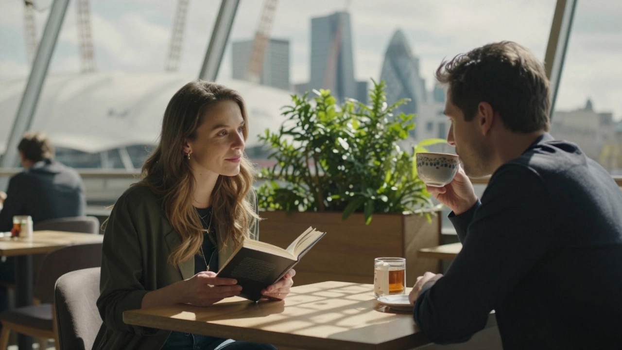 Two people share a quiet tea at The O2 Sky Garden café, sunlight filtering through the glass ceiling.