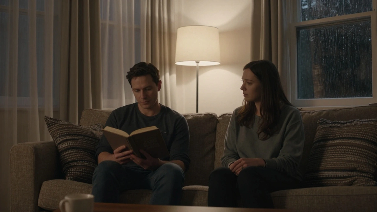 Two people sharing a quiet evening in a softly lit living room, one reading aloud to the other.